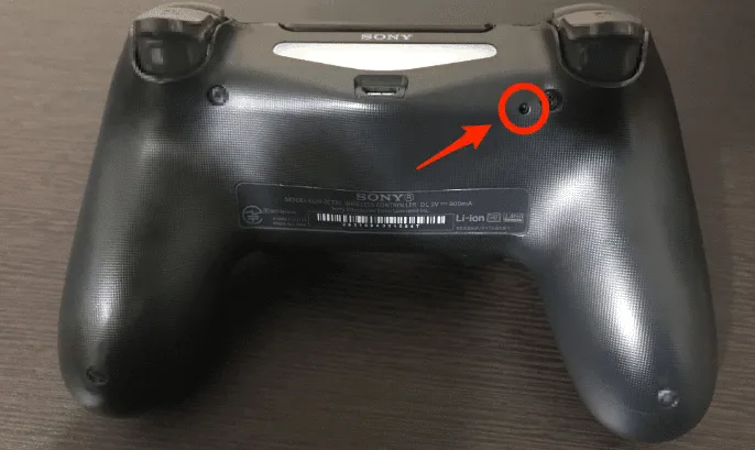 Reset PS4 Controller: Hard Reset Hole on the back of PS4 DualShock 4 Controller