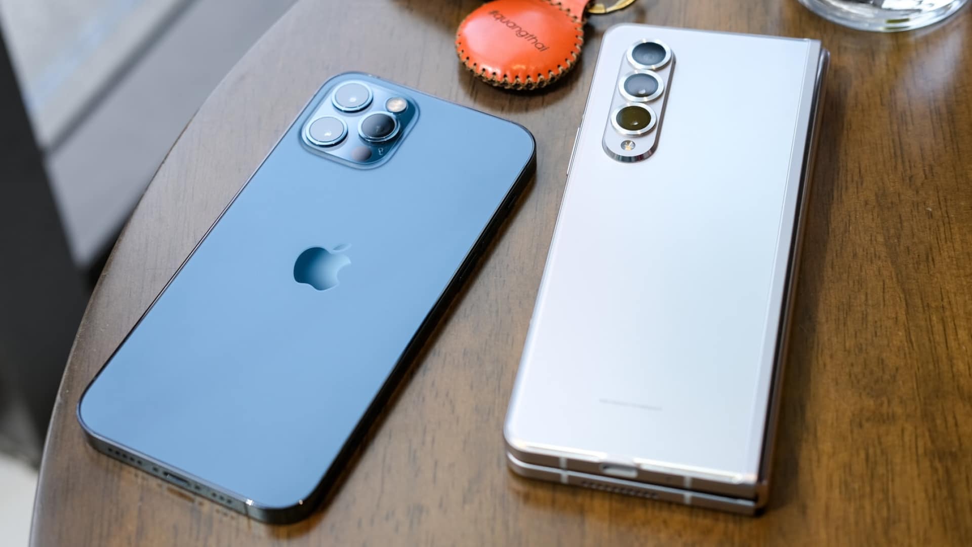 iPhone 12 Pro and Galaxy Fold 2 flipped on table